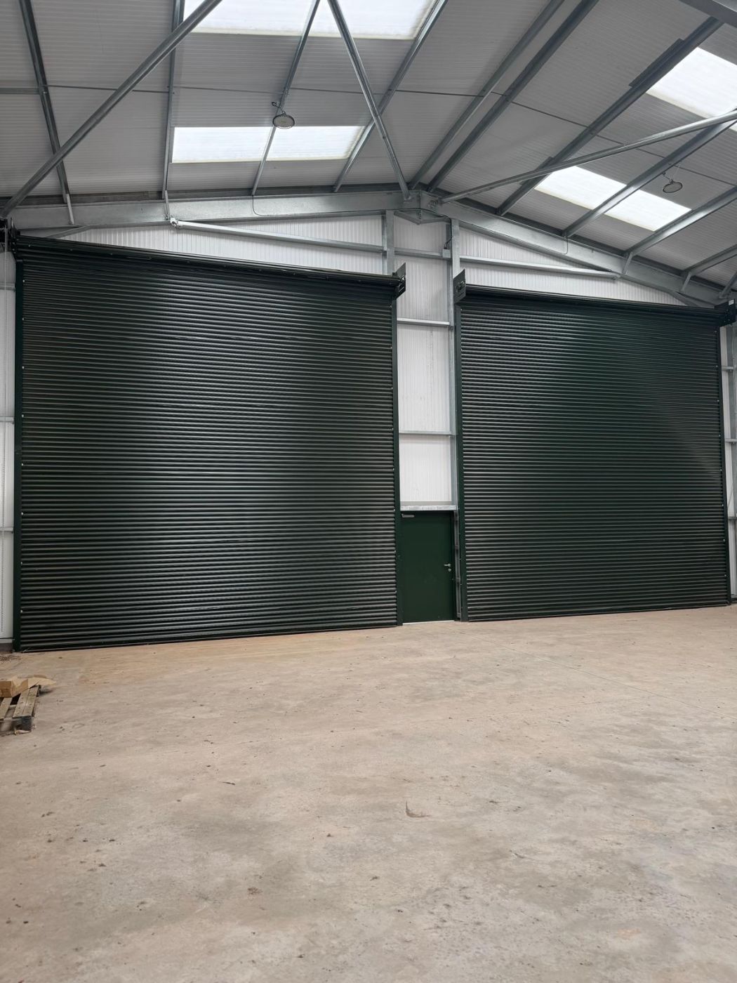 Twin roller shutters in a new-build warehouse