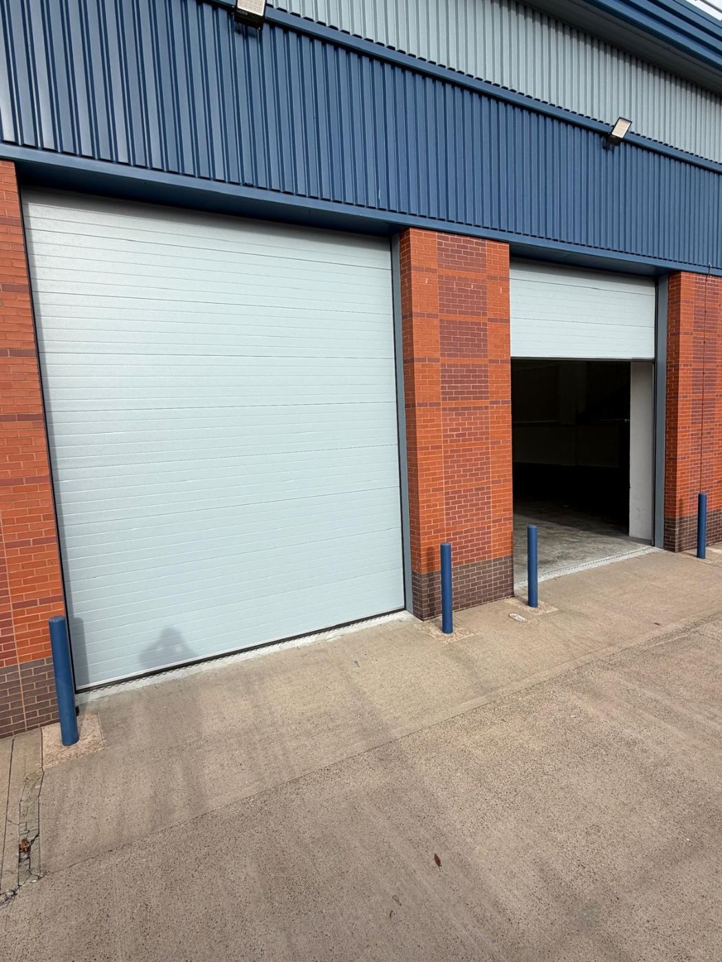 Insulated sectional doors on a trade unit